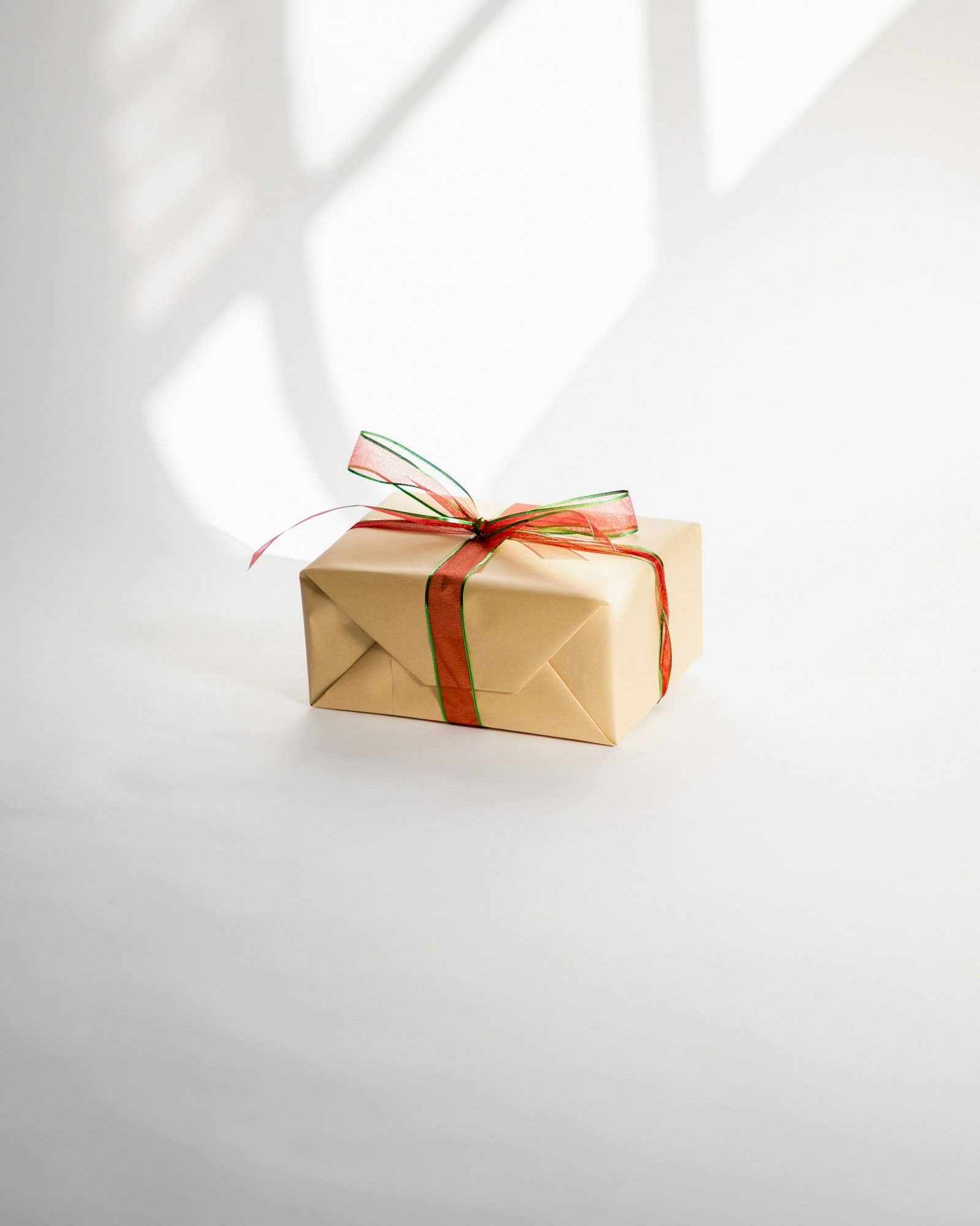 Small gift parcel tied with ribbon