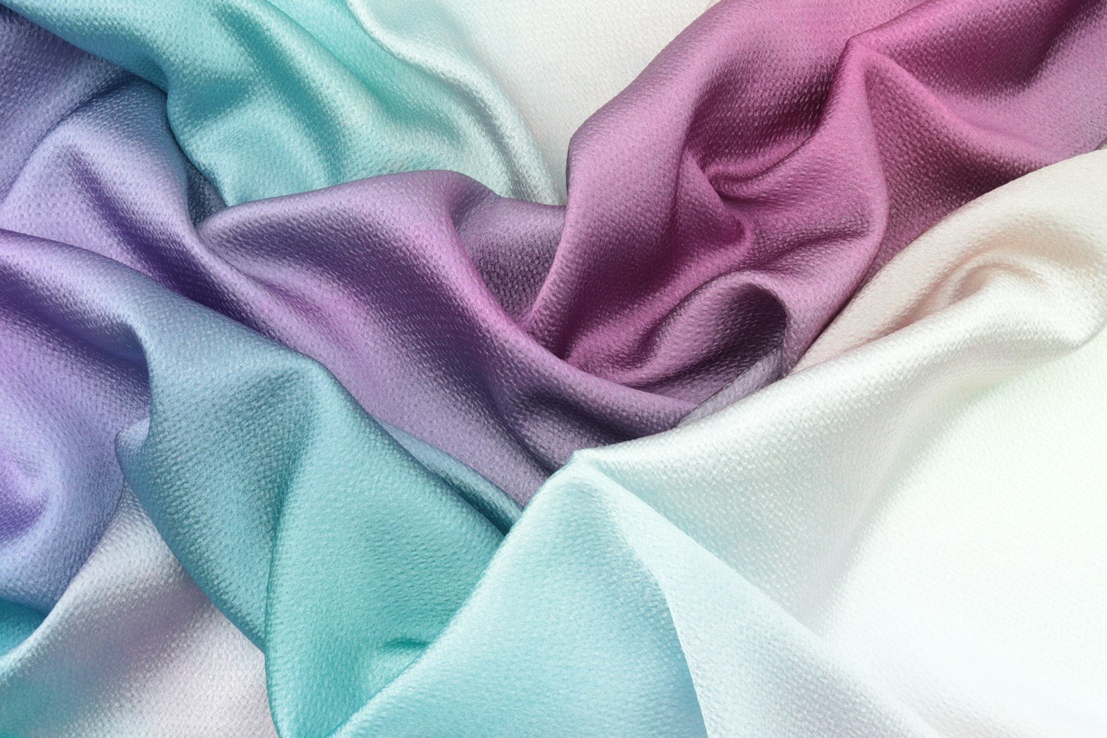 Soft draped silk fabric in pastel colours